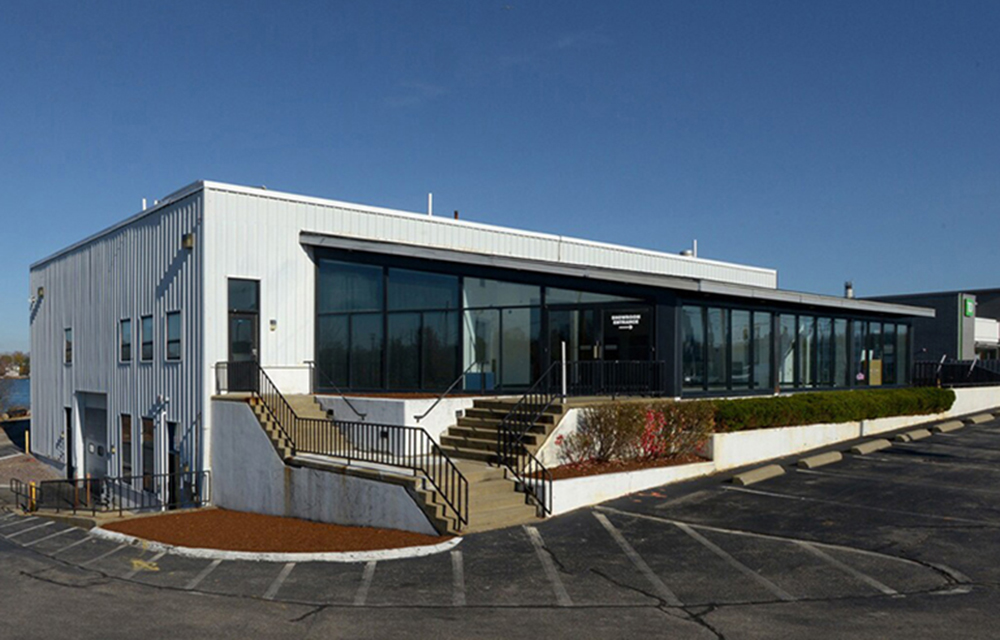 Hilson of Perry CRE brokers sale  of 425 Lincoln St. for A.W. Perry